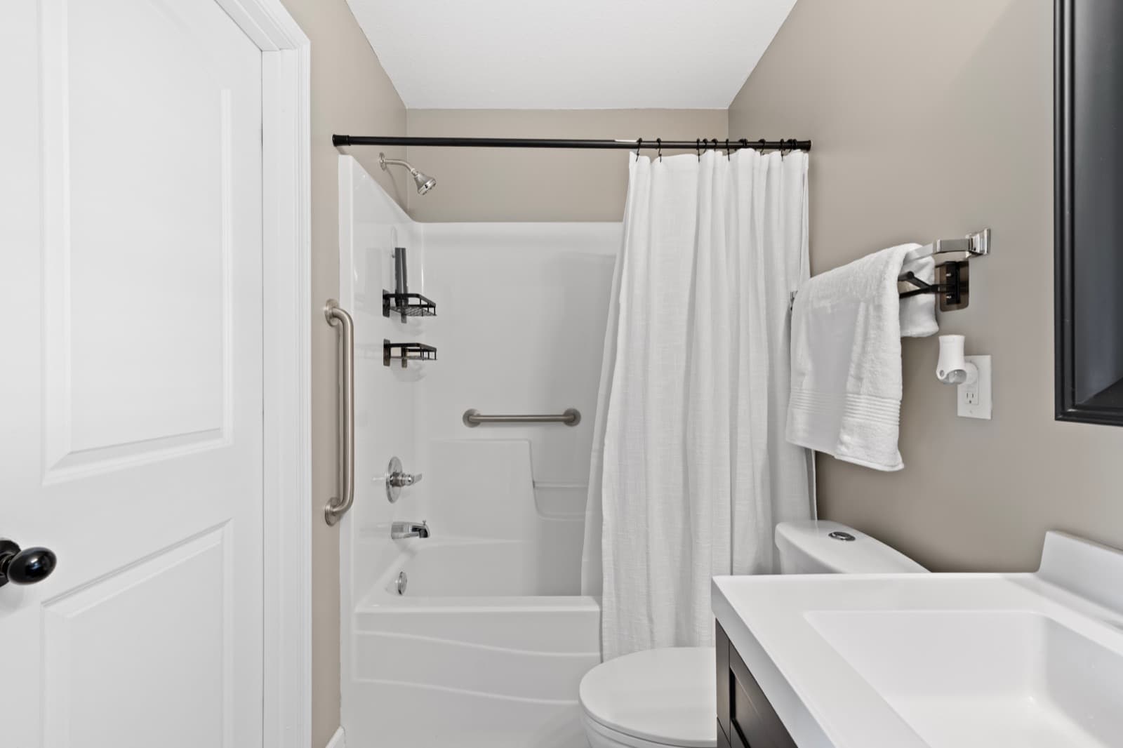 Grab bars in the tub-shower