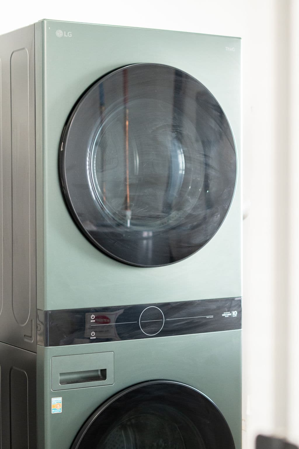 Sage-green LG WashTower stacked washer and dryer